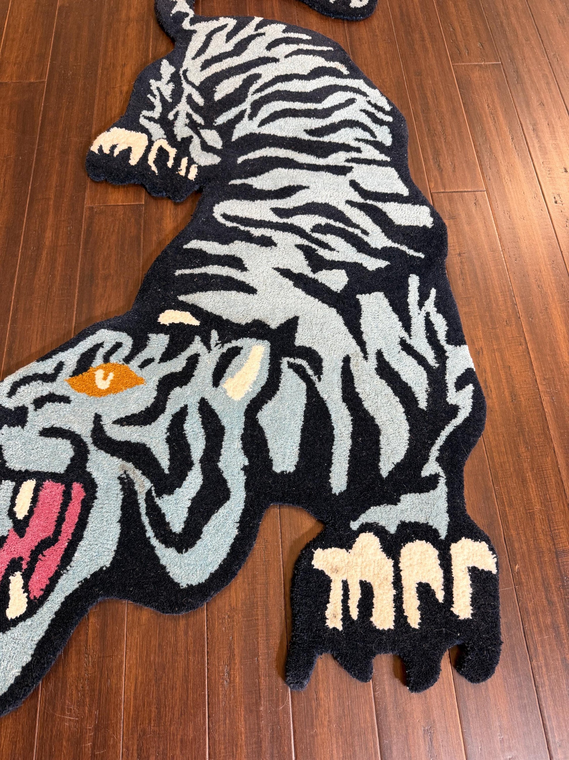 tiger area rug
jungle animal decor
hand tufted rug
tiger nursery rug
oriental tiger rug
tiger print rug
safari animal rug
artisan wool rug
tiger floor mat
bold animal rug
jungle theme rug
exotic wool carpet
tiger home decor
wild animal rug
handmade floor rug
Turkish novelty rug
statement area rug
boho jungle decor
jungle inspired rug
wildcat rug
tiger room decor
luxury wool rug
Turkish crouching tiger
tiger shape rug