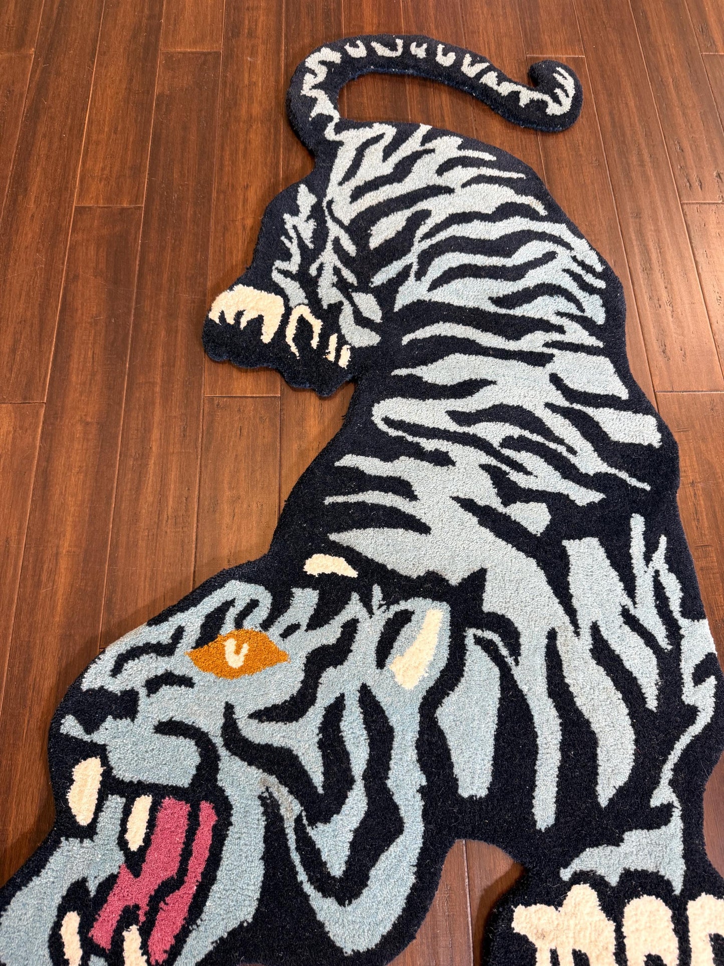 tiger area rug
jungle animal decor
hand tufted rug
tiger nursery rug
oriental tiger rug
tiger print rug
safari animal rug
artisan wool rug
tiger floor mat
bold animal rug
jungle theme rug
exotic wool carpet
tiger home decor
wild animal rug
handmade floor rug
Turkish novelty rug
statement area rug
boho jungle decor
jungle inspired rug
wildcat rug
tiger room decor
luxury wool rug
Turkish crouching tiger
tiger shape rug