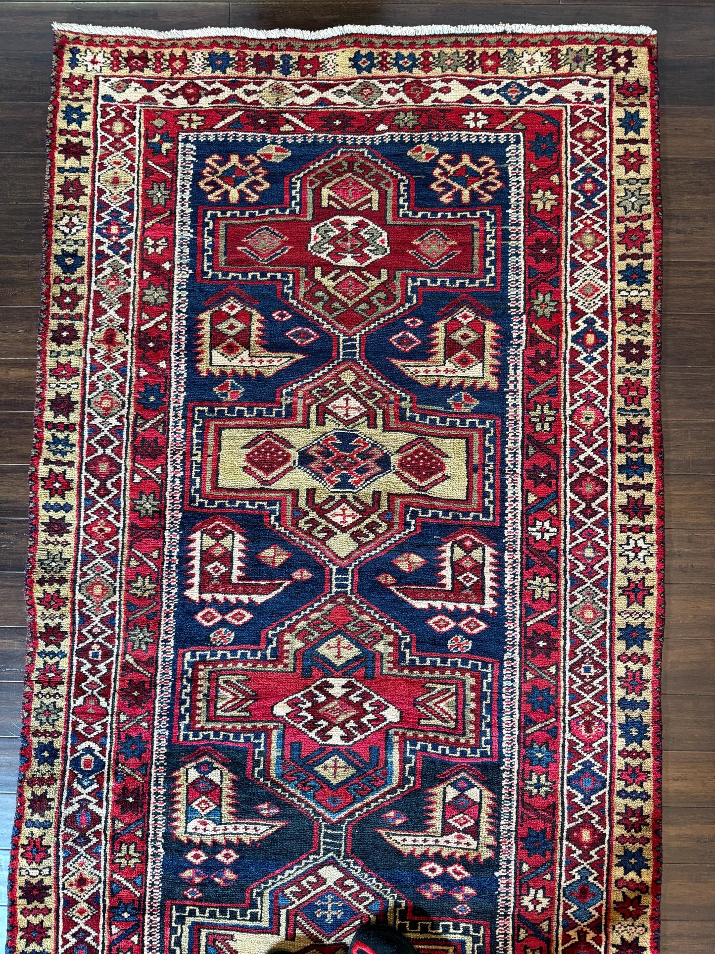 4x11 ft Vintage 1980s Tribal Heriz Runner Rug: Hand Knotted Wool Design