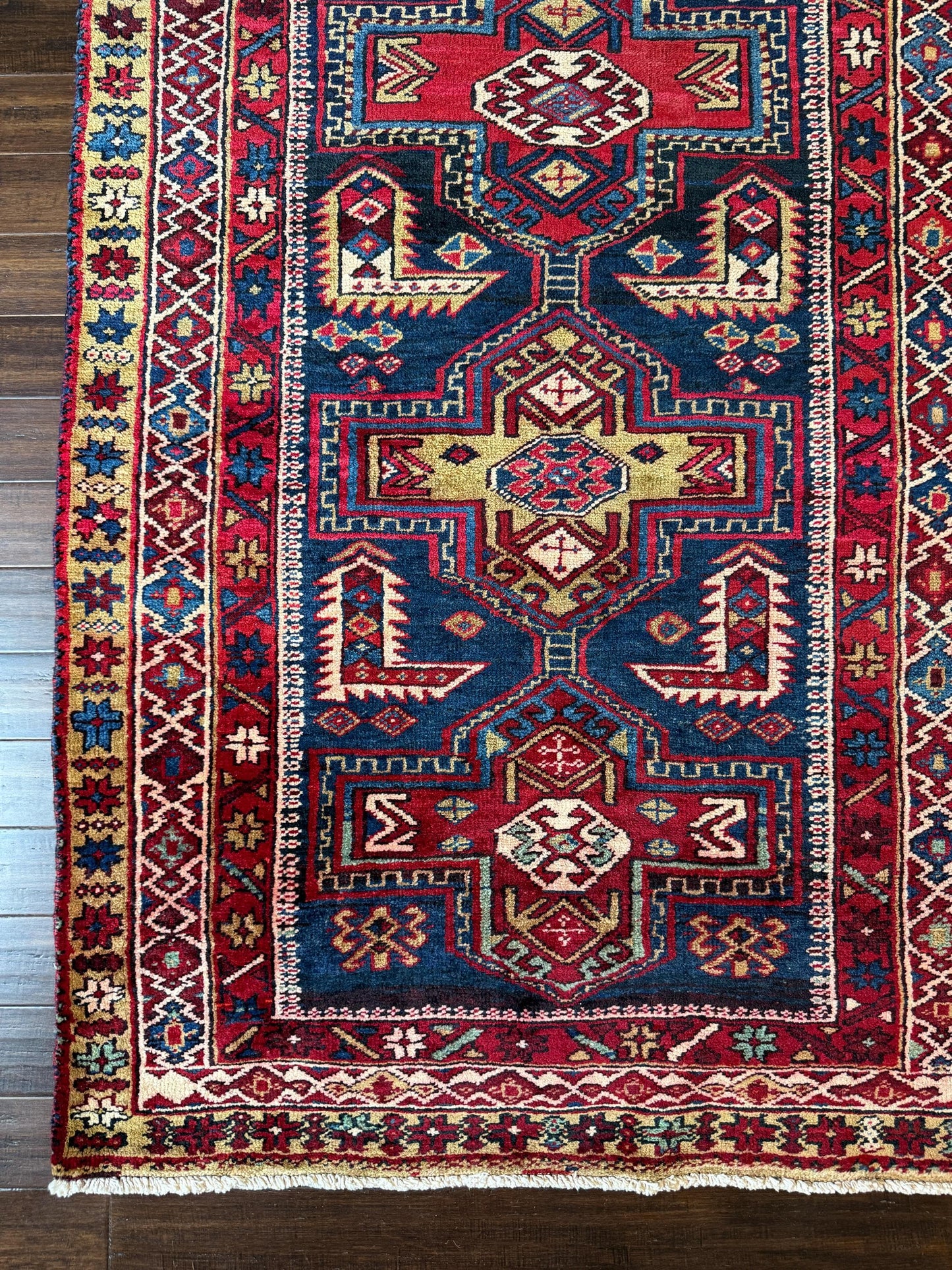 4x11 ft Vintage 1980s Tribal Heriz Runner Rug: Hand Knotted Wool Design