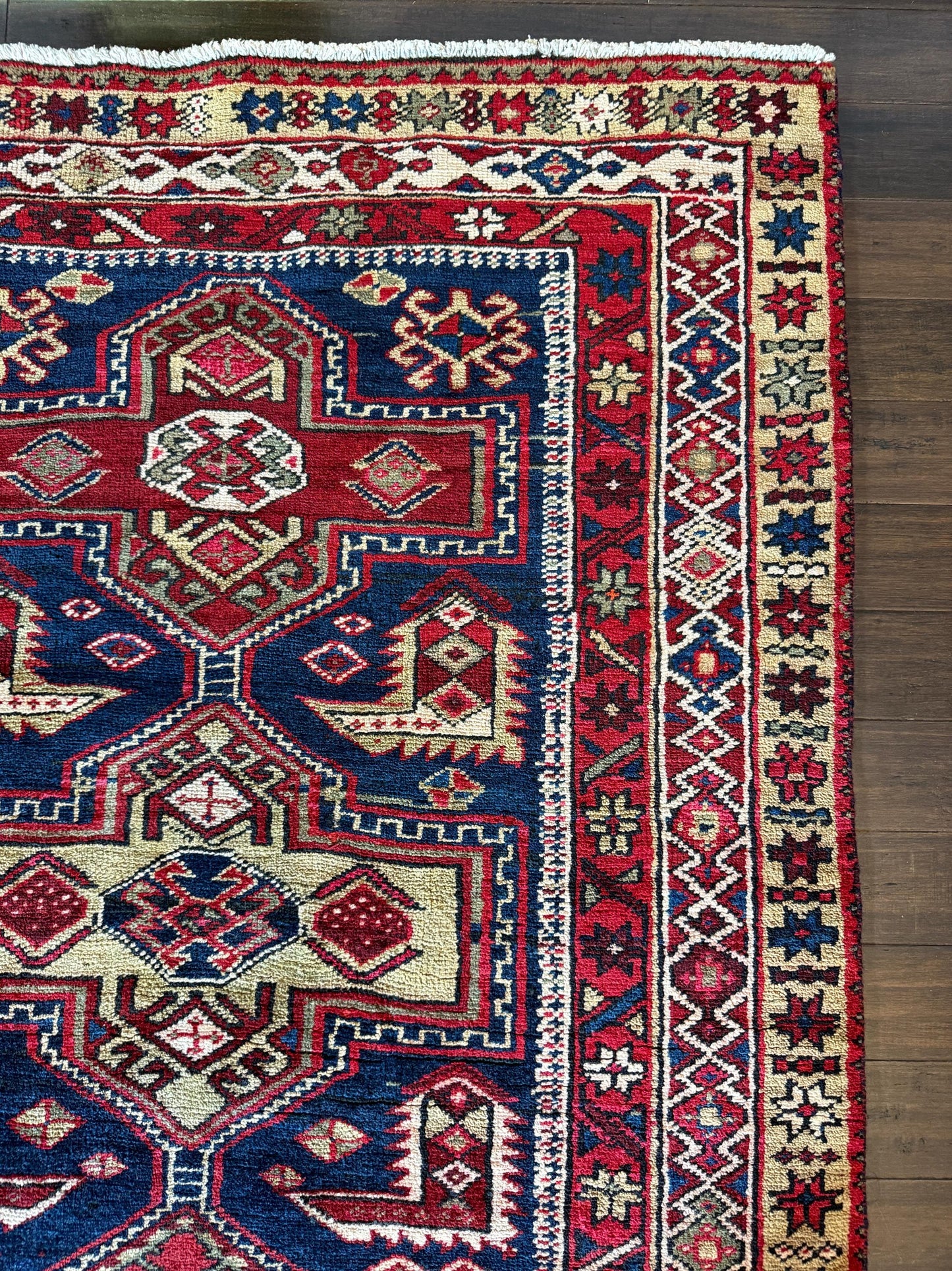 4x11 ft Vintage 1980s Tribal Heriz Runner Rug: Hand Knotted Wool Design