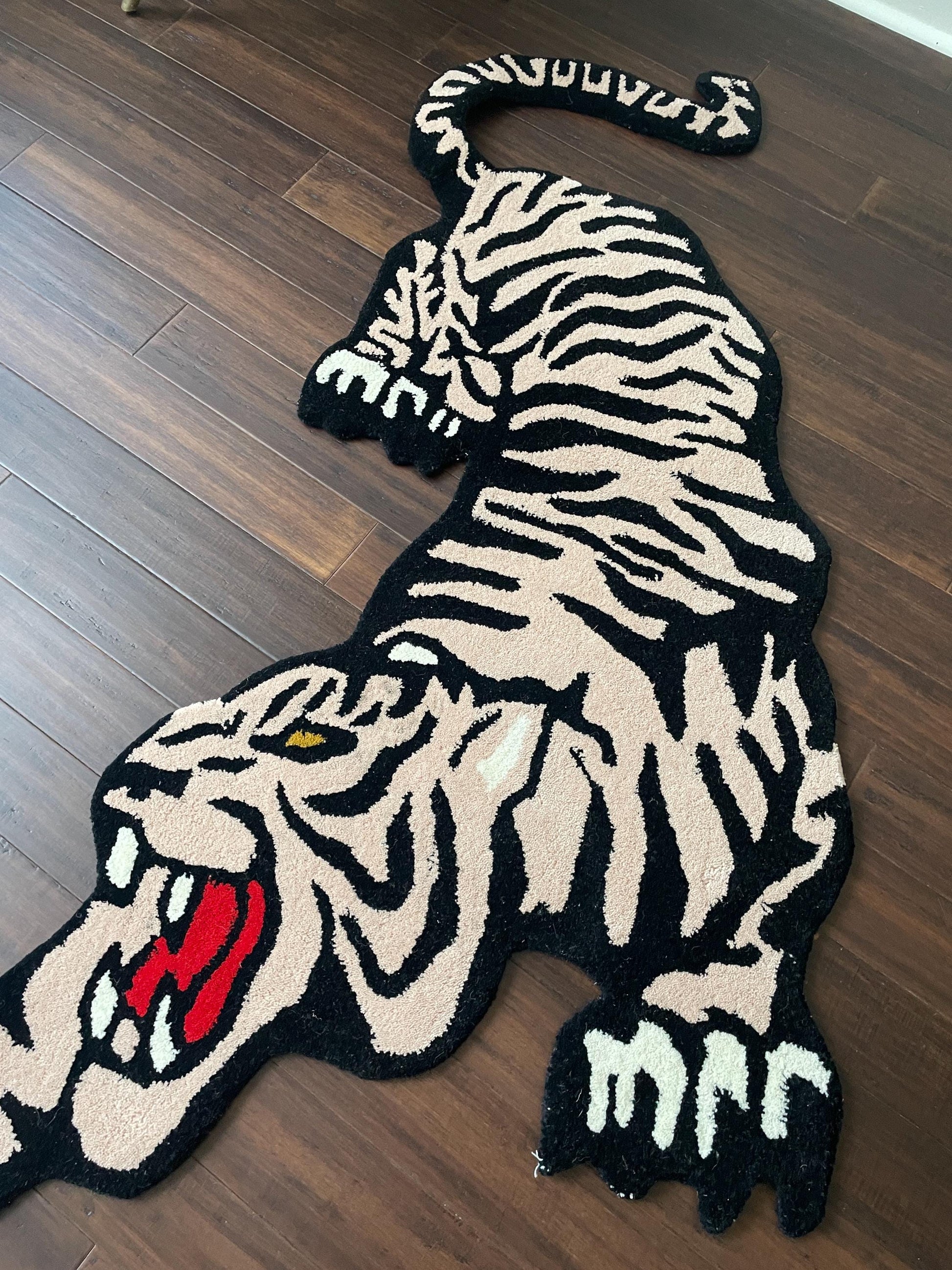 tiger shaped rug
novelty animal rug
oriental wool rug
tiger area carpet
jungle theme decor
boho tiger rug
3x5 wool rug
animal shape rug
artisan tiger rug
safari room rug
tiger print floor rug
tiger wall hanging
Asian style rug
eclectic animal rug
wool novelty rug
tiger room decor
bohemian tiger carpet
oriental animal rug
jungle nursery rug
bold statement rug
fierce tiger rug
boho animal rug
tiger playroom mat
Tibetan tiger rug style
animal motif area rug
wool jungle rug