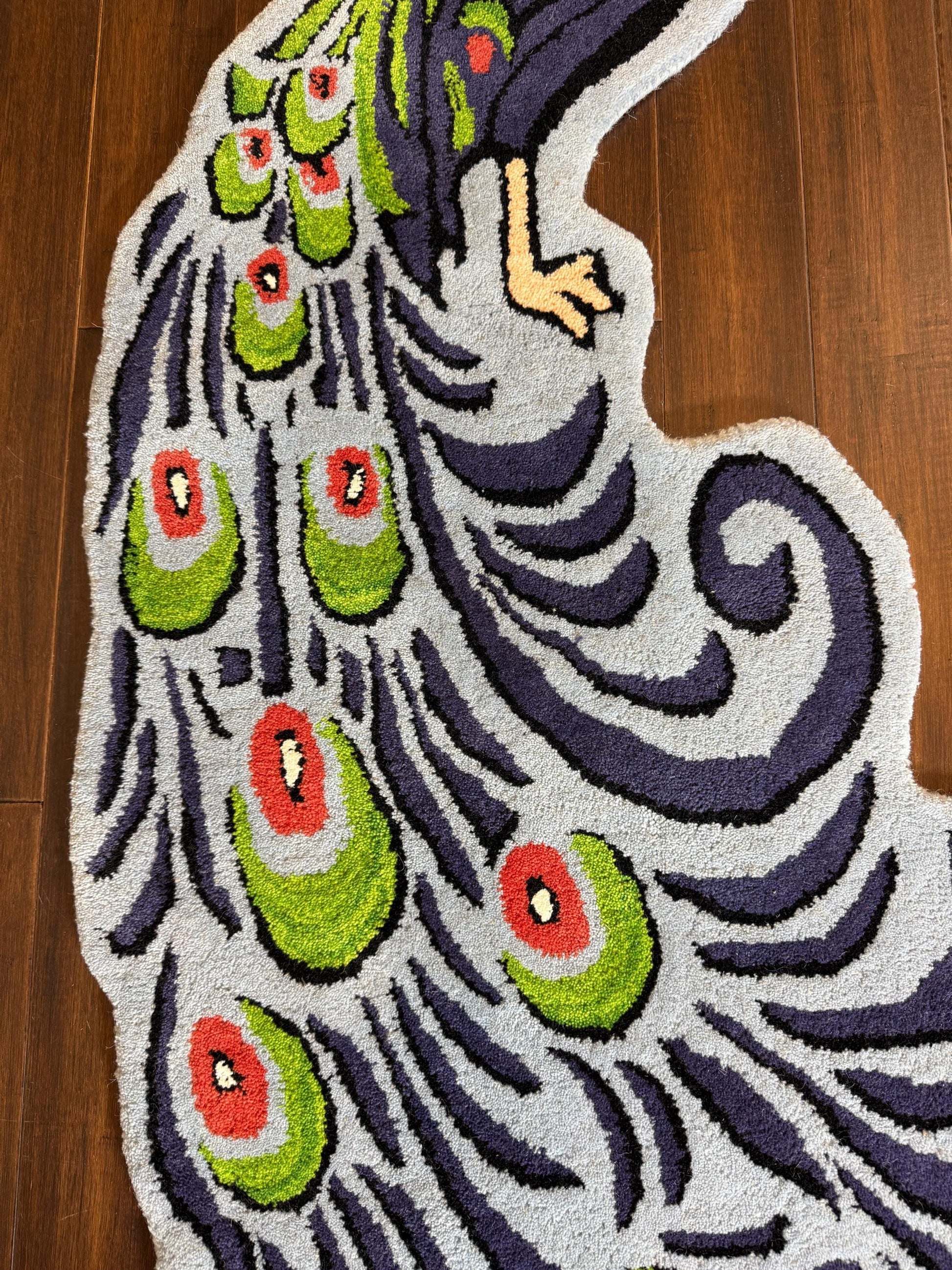 modern turkish rug, handmade peacock rug, fine tufted wool rug, boho kids room rug, animal shaped area rug, 3x5 wool rug, nursery decor rug, playful kids carpet, eco friendly wool rug, unique animal rug, toddler playroom rug, colorful peacock carpet, bohemian home decor, soft wool carpet, turkish handmade rug