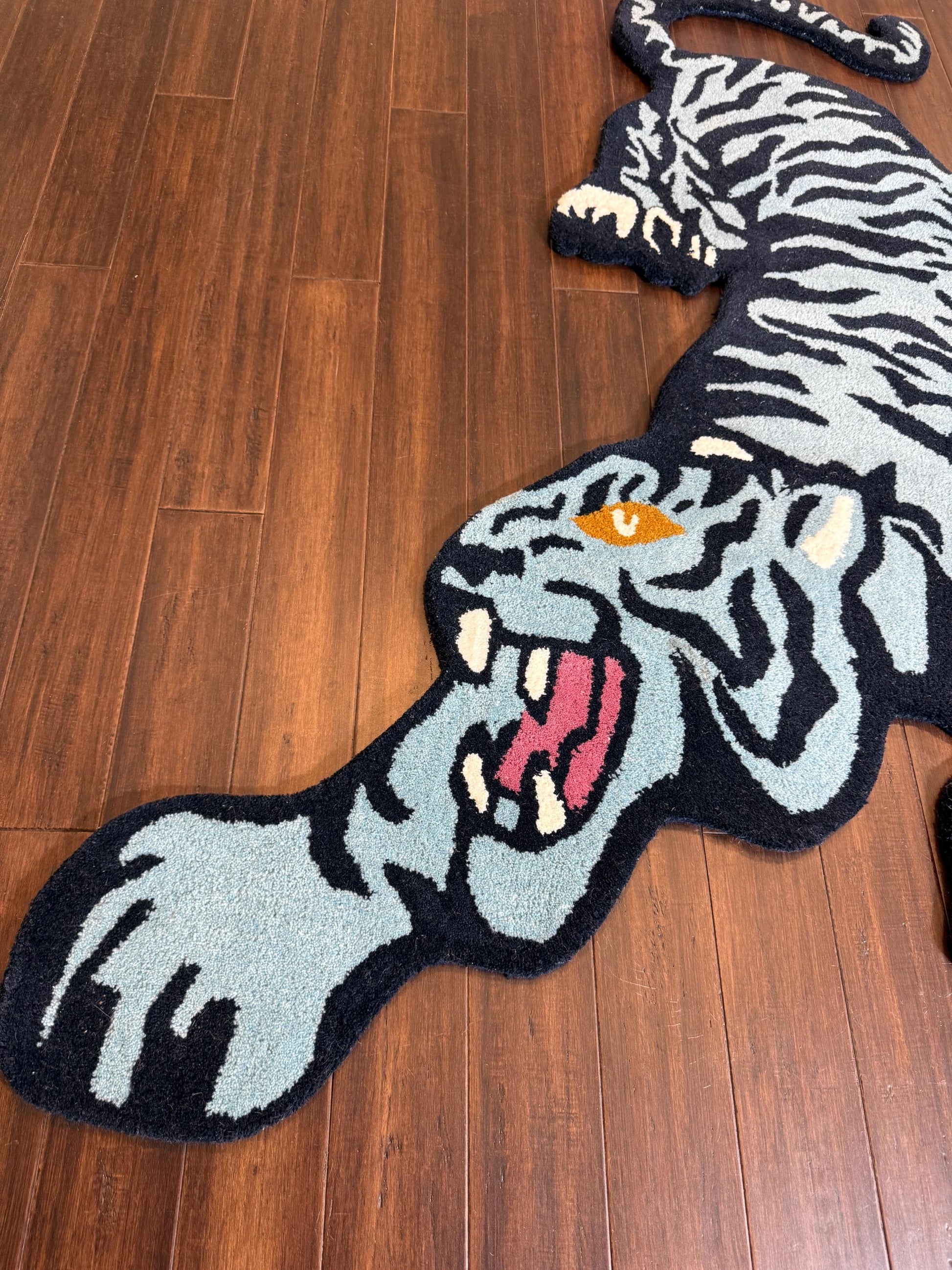 tiger area rug
jungle animal decor
hand tufted rug
tiger nursery rug
oriental tiger rug
tiger print rug
safari animal rug
artisan wool rug
tiger floor mat
bold animal rug
jungle theme rug
exotic wool carpet
tiger home decor
wild animal rug
handmade floor rug
Turkish novelty rug
statement area rug
boho jungle decor
jungle inspired rug
wildcat rug
tiger room decor
luxury wool rug
Turkish crouching tiger
tiger shape rug