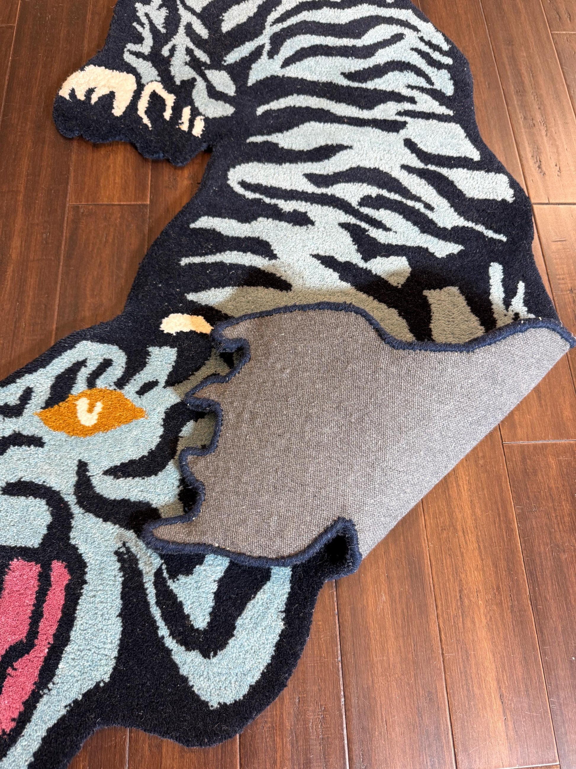 tiger area rug
jungle animal decor
hand tufted rug
tiger nursery rug
oriental tiger rug
tiger print rug
safari animal rug
artisan wool rug
tiger floor mat
bold animal rug
jungle theme rug
exotic wool carpet
tiger home decor
wild animal rug
handmade floor rug
Turkish novelty rug
statement area rug
boho jungle decor
jungle inspired rug
wildcat rug
tiger room decor
luxury wool rug
Turkish crouching tiger
tiger shape rug