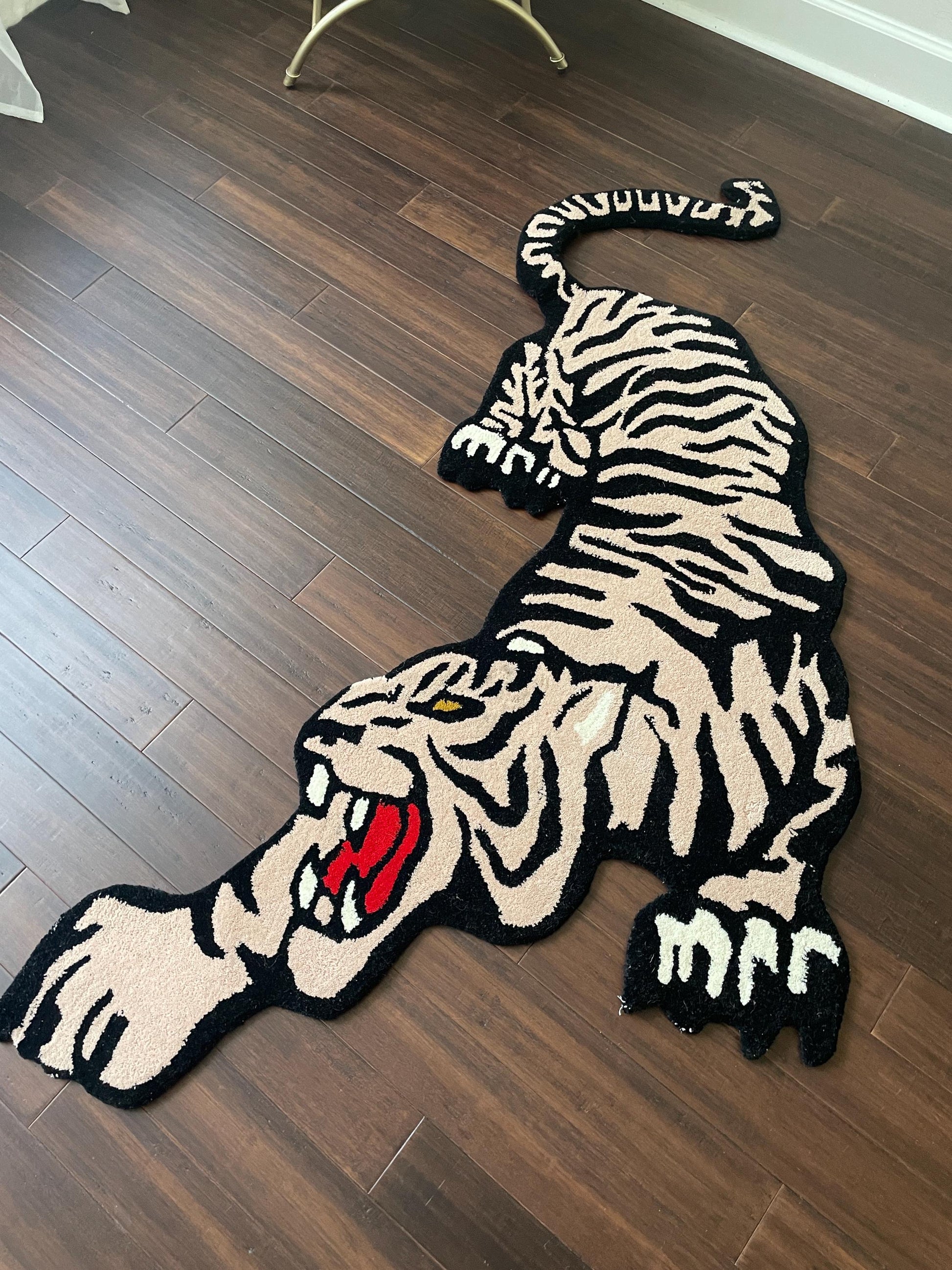 tiger shaped rug
novelty animal rug
oriental wool rug
tiger area carpet
jungle theme decor
boho tiger rug
3x5 wool rug
animal shape rug
artisan tiger rug
safari room rug
tiger print floor rug
tiger wall hanging
Asian style rug
eclectic animal rug
wool novelty rug
tiger room decor
bohemian tiger carpet
oriental animal rug
jungle nursery rug
bold statement rug
fierce tiger rug
boho animal rug
tiger playroom mat
Tibetan tiger rug style
animal motif area rug
wool jungle rug
