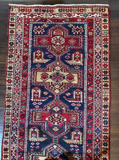 4x11 ft Vintage 1980s Tribal Heriz Runner Rug: Hand Knotted Wool Design