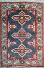 4.2x6 ft Hand-Knotted Heriz Wool Rug: Vibrant Serapi Style